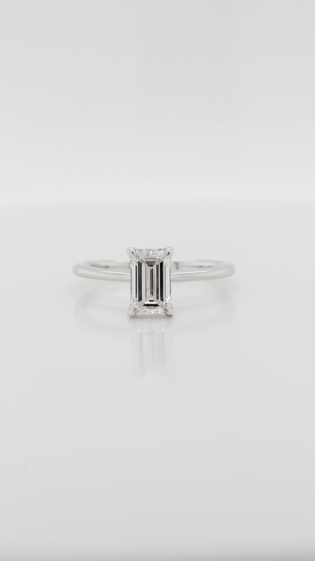 1.11ct Emerald Cut Diamond in the Parker Classic Solitaire with Hidden Halo