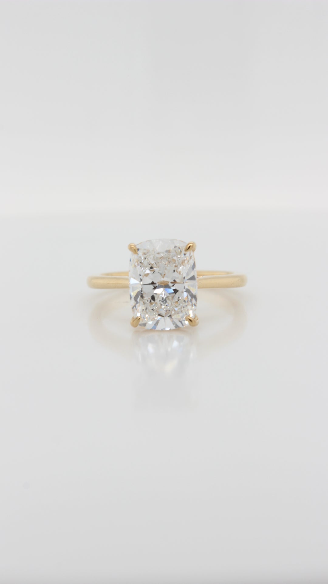 Elongated Cushion Cut Diamond in the Parker Classic Solitaire with Hidden Halo