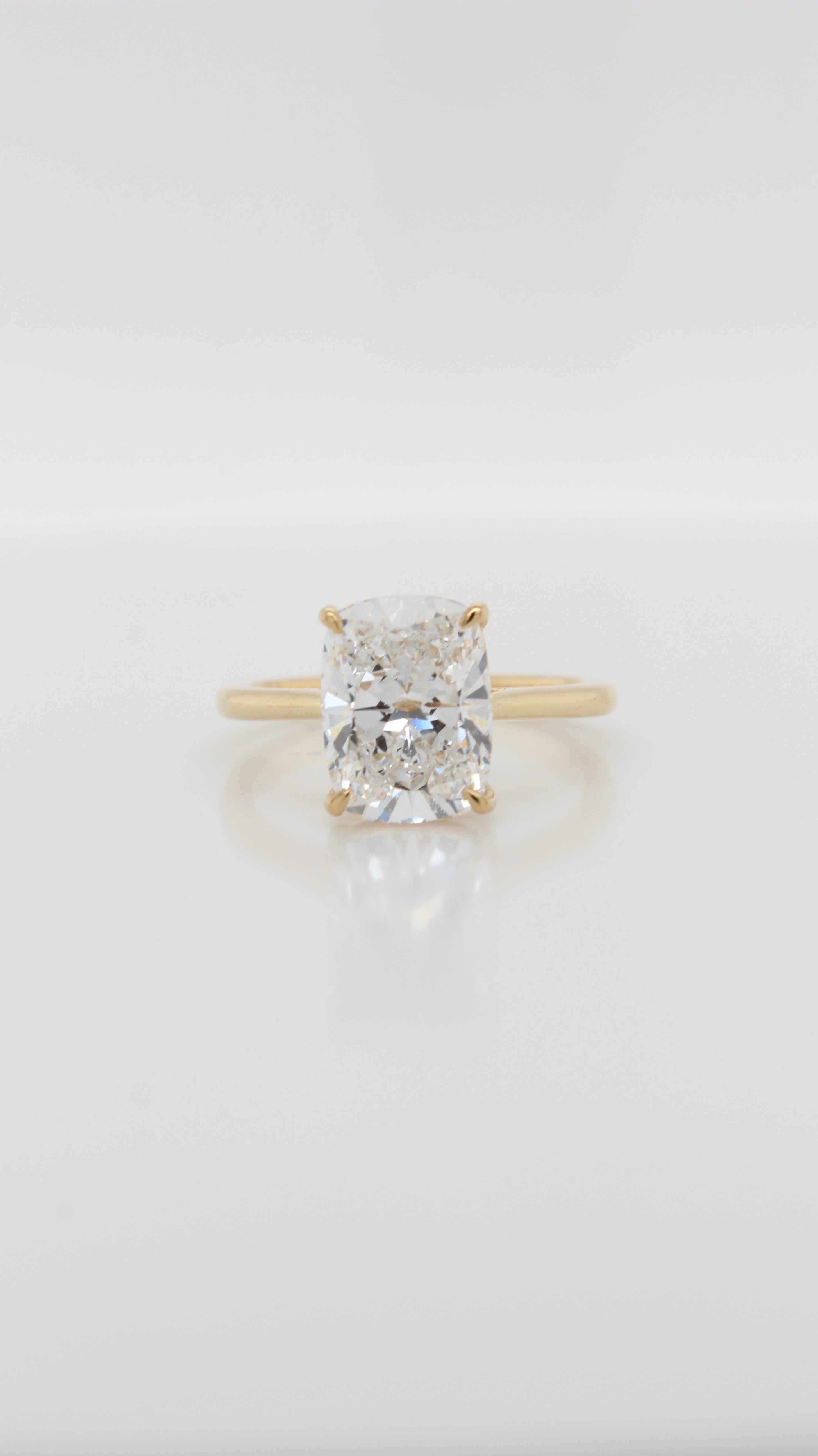 Elongated Cushion Cut Diamond in the Parker Classic Solitaire with Hidden Halo