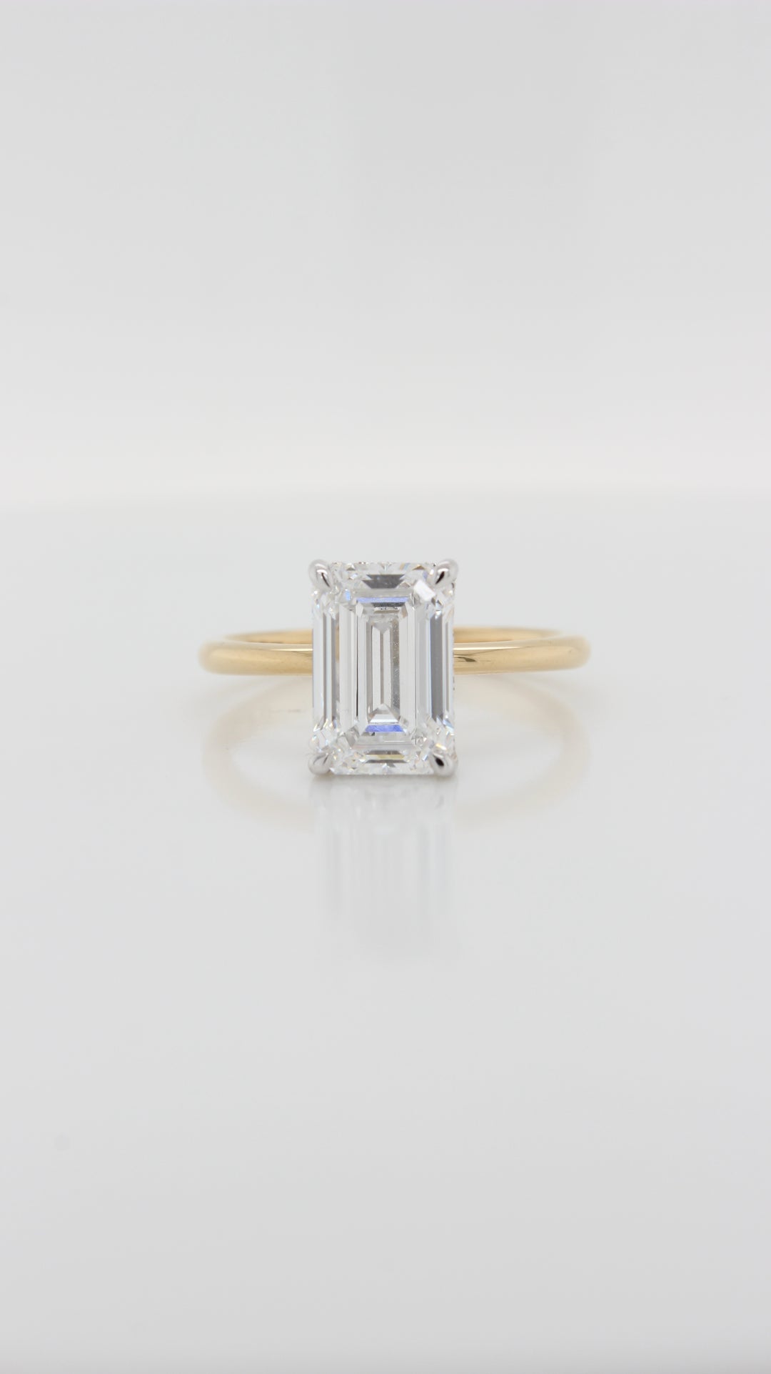 2.69ct Emerald Cut Diamond in the Parker Classic Solitaire with Hidden Halo