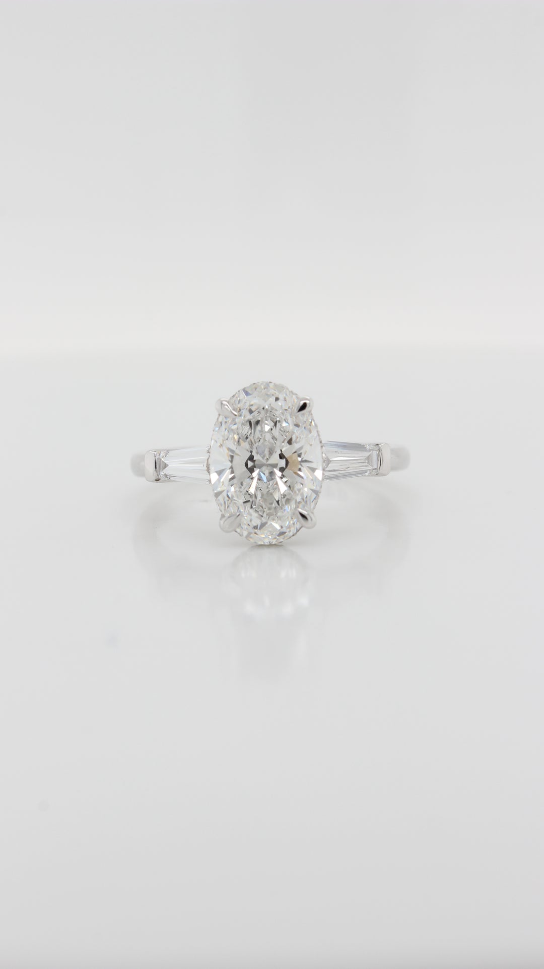 Oval Cut Diamond Trilogy Siena Design with 2 matching tapered Baguettes