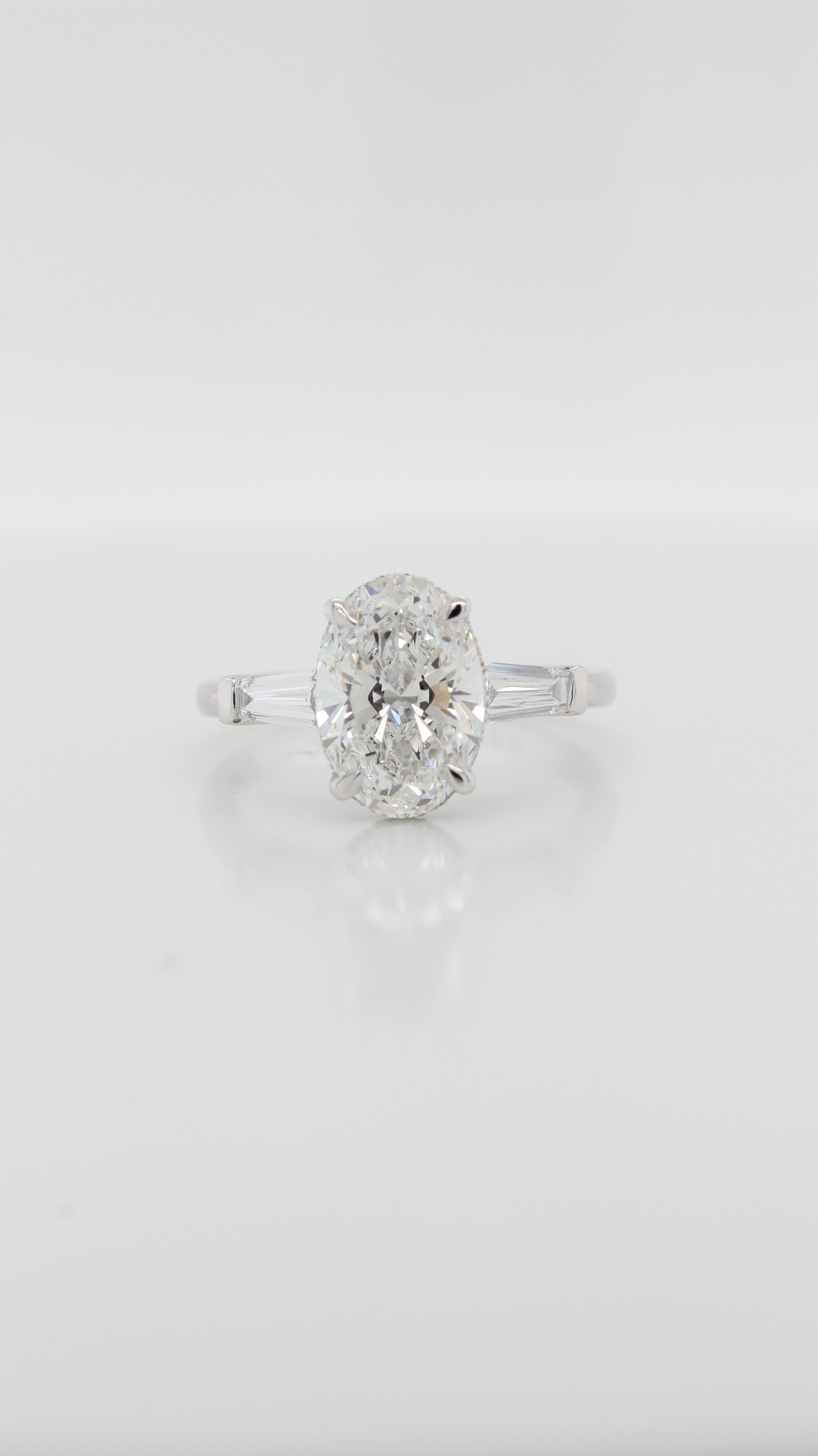 Oval Cut Diamond Trilogy Siena Design with 2 matching tapered Baguettes