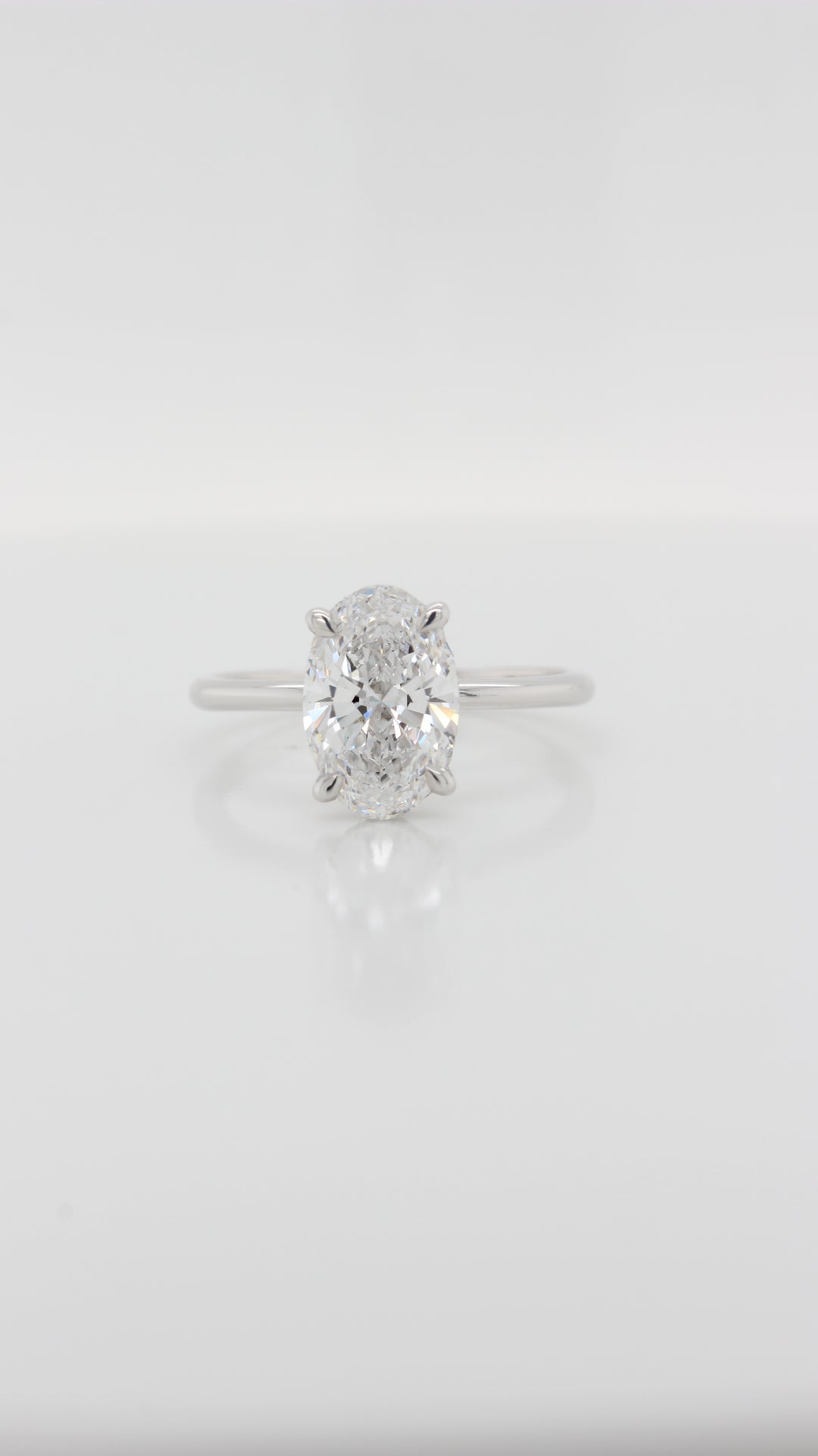 1.82Ct Oval Cut Diamond in the Parker Classic Solitaire with Hidden Halo