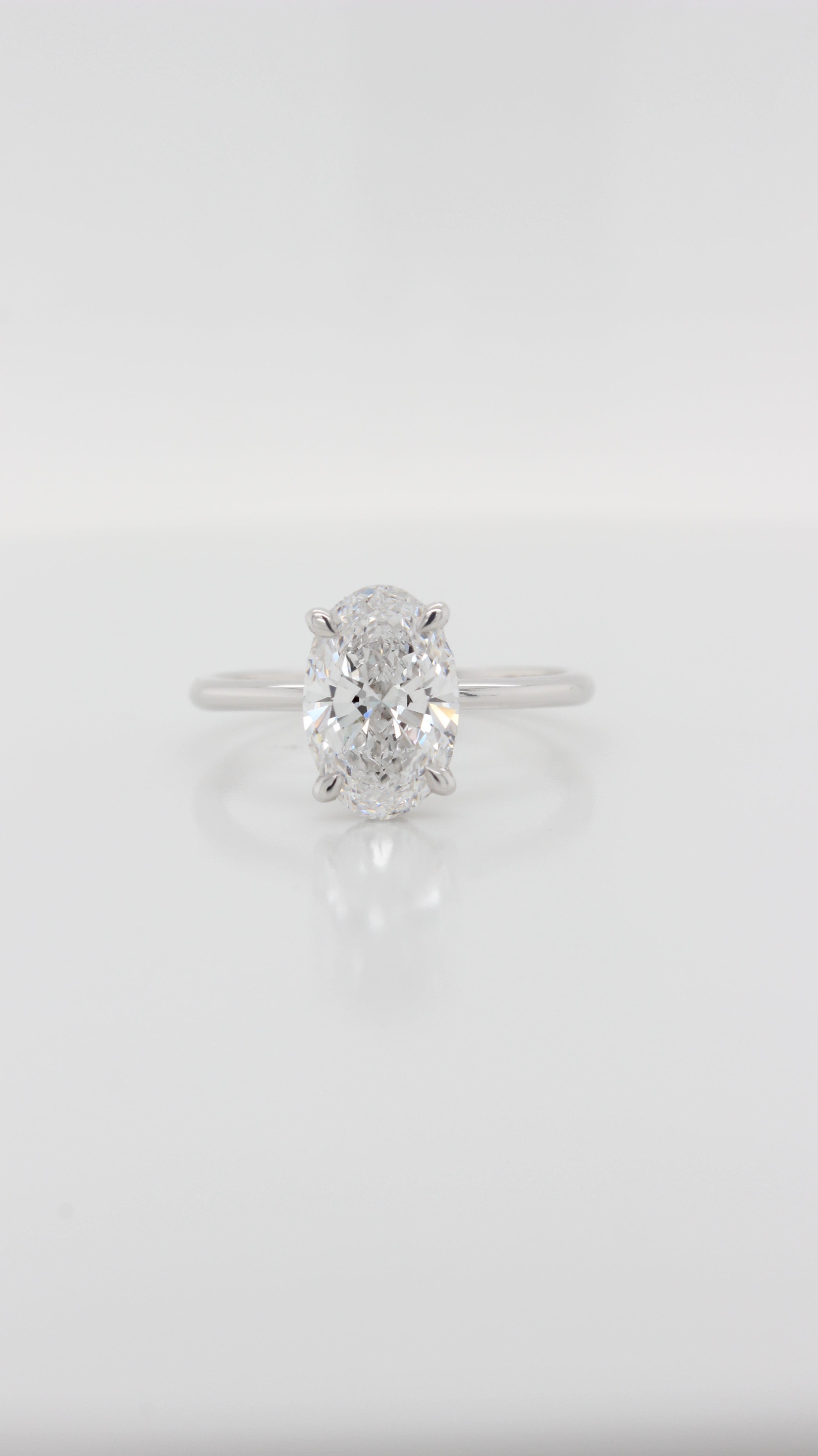 2.21Ct Oval in the Parker Classic Solitaire with Hidden Halo