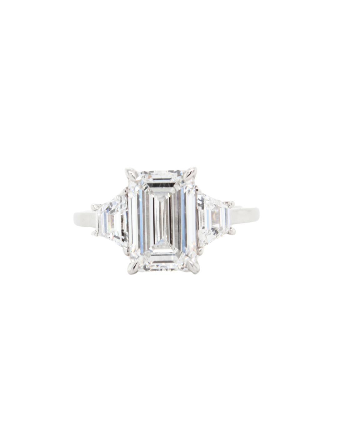 Emerald Cut Diamond with Trapezoid Sides in the Trilogy Design with Hidden Halo